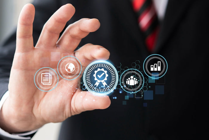 Hand interacting with digital icons on a blurred background